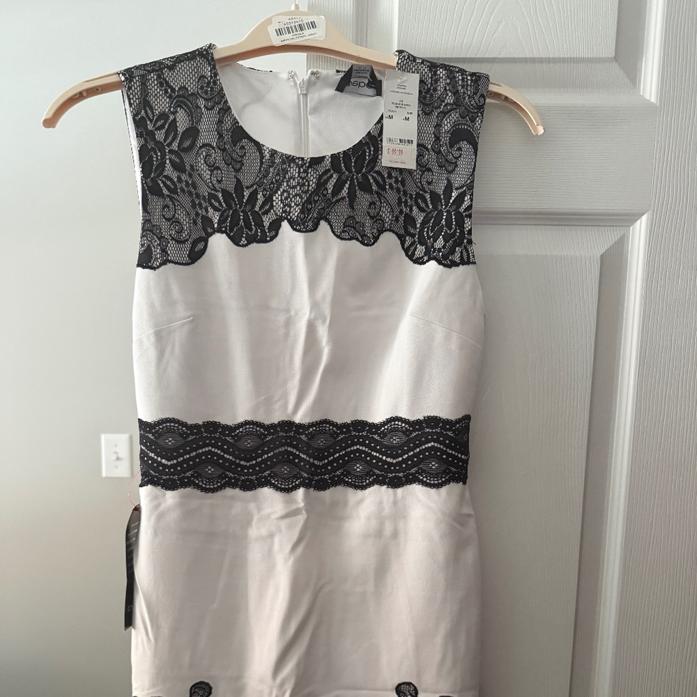 Bebe never worn black and white dress size M